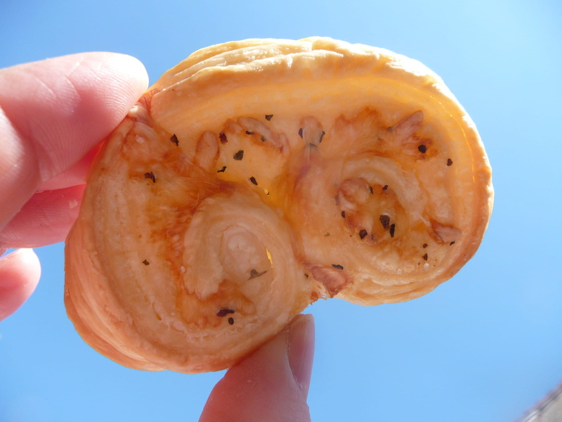 food and drink, blue background, sky, missing bite, 2K, human finger, childhood, body part, human body part, offspring, freshness, puff pastry, day, holding