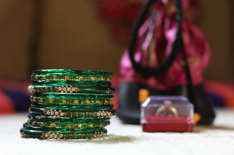 arts culture and entertainment, bracelets, green, playing, close-up, finance, focus on foreground, standing, table, 5K, glass, bangels, leisure activity
