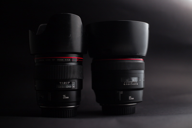 lenses, food, group of objects, photography themes, still life, camera, 5K, red, equipment, indoors, black color, gray background, stack, two objects