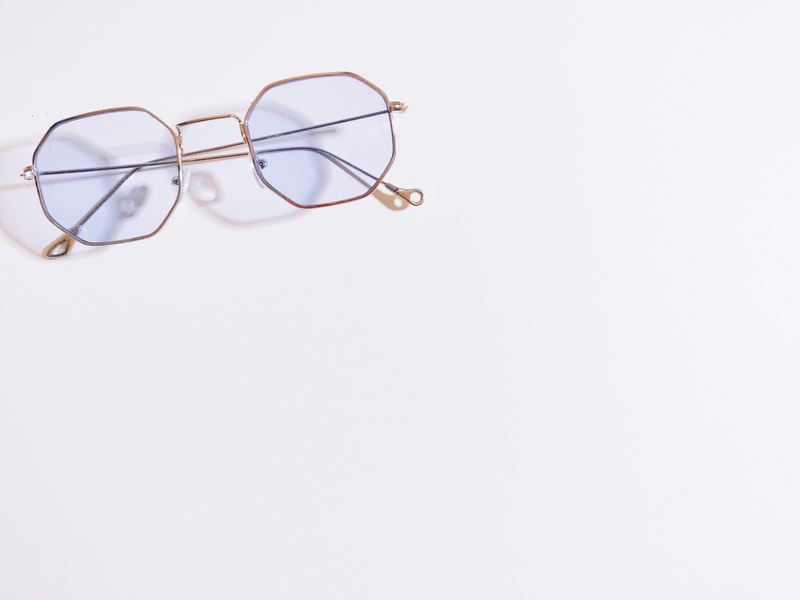 art, single object, high angle view, surface, 4K, eyewear, glasses, eyesight, framed, design, copy space, two objects, simplicity, indoors, lens, still life
