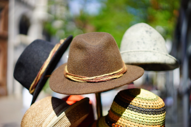 hat sale, selective, close-up, stacked, textured, wool felt, focus, photography, focus on foreground, seat, rear view, cord band, wood - material, headwear