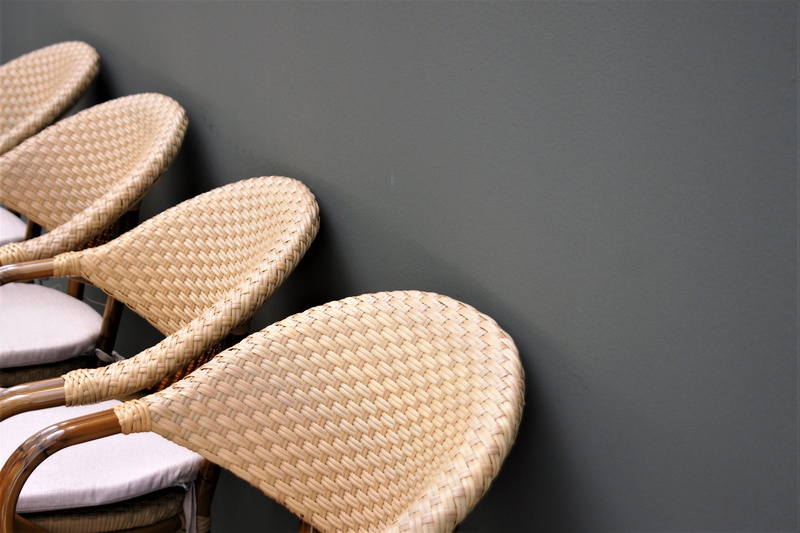 slipper, chairs, wall - building feature, rattan, high angle view, furniture pieces, indoors, security, seat, clothing, large group of objects, chair, personal accessory