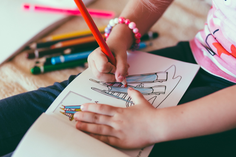 holding, one person, close-up, art and craft, art, pen, childhood, coloring, offspring, bracelet, baby, color, drawing - art product, paper, kid, girl