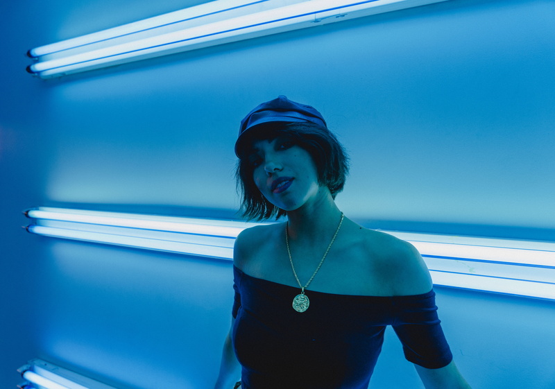 front view, finger, human, beautiful woman, illuminated, evening dress, back, accessory, day, indoors, blue, uv, apparel, fashion, gown, one person, casual clothing