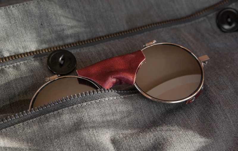 no people, glasses mountaineer, close-up, zipper, fashion, protection, garment, pocket, sunglasses, still life, clothing, jeans, indoors, material, warm clothing