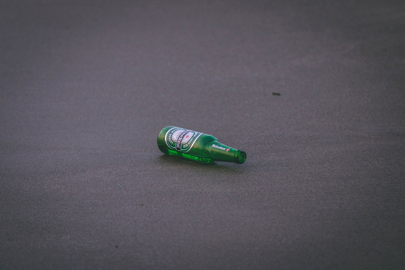 high angle view, road, alcohol, finance, healthcare and medicine, color, economy, outdoors, business, street, glass, ground, single object, table, still life