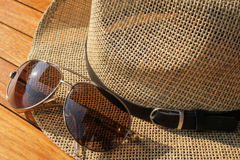 darken, leisure, fashion, sun protection, security, relaxation, brown, sun hat, shoe, protection, arts culture and entertainment, sunglasses, wood - material