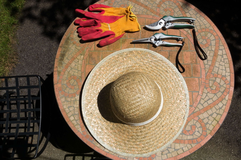 table, hat, protection, close-up, design, security, pruning shears, pattern, sun hat, sunlight, handmade, 4K, arts culture and entertainment, glove, clothing