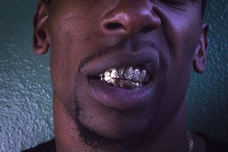 lifestyles, grillz, one person, front view, real people, purple, dental, beard, male, man, portrait, facial hair, young men, gold, human lips, leaning