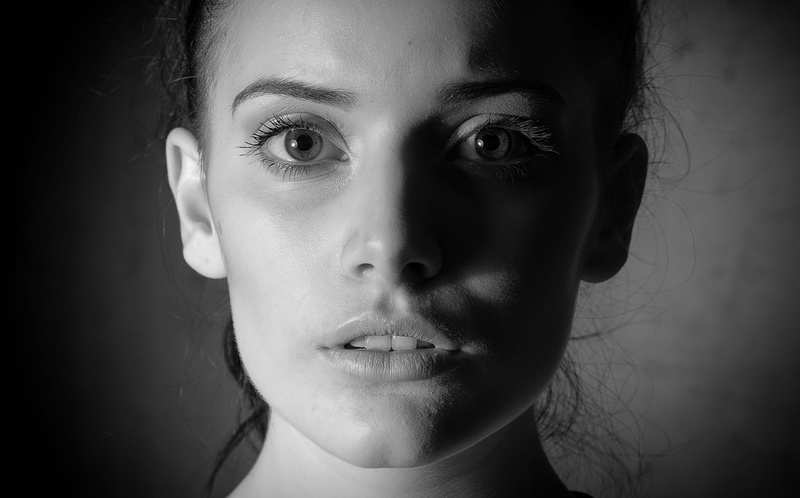 beautiful woman, front view, emotion, indoors, women, black and white, woman, 1080P, lowkey, human face, headshot, focus on foreground, white, s, expression