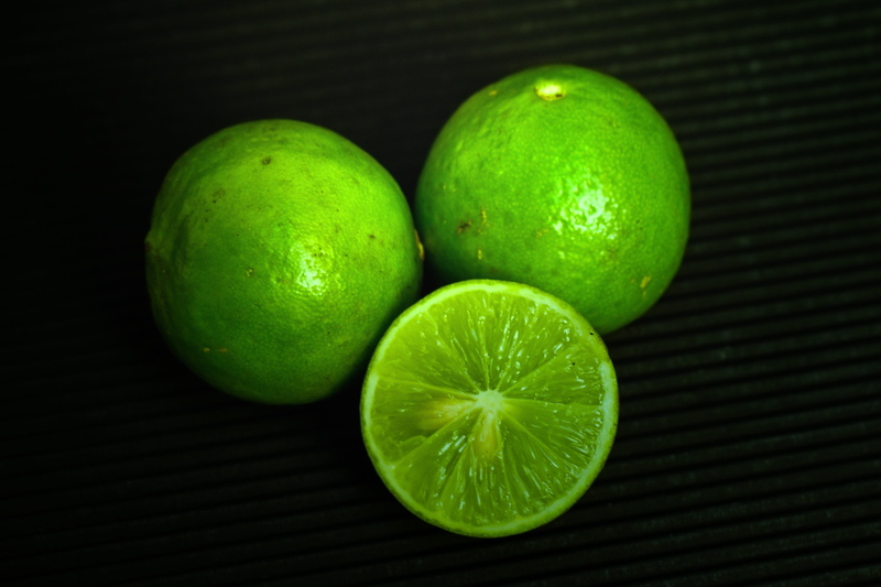 studio shot, food, group of objects, black background, high angle view, apple - fruit, green color, lime, healthy, lemon, acid, close-up, citrus fruit