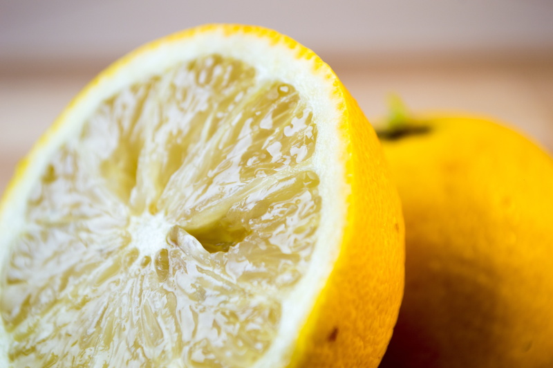 freshness, acidity, slice, citrus fruit, focus on foreground, indoors, studio shot, halved, vitamin c, yellow, citrus, lemon, no people, lime, fruit, orange