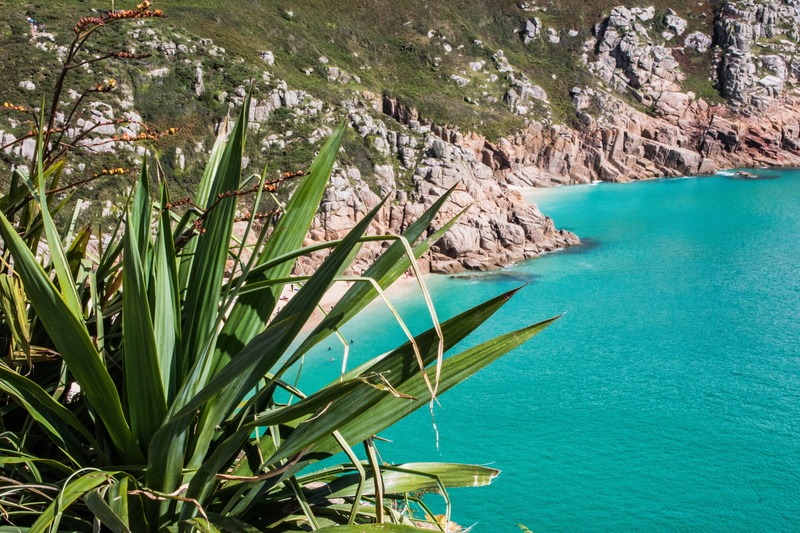 mode of transportation, beauty in nature, minack theatre, green color, sun, outdoors, cornwall, idyllic, porthcurno, green, sand, rocks, the minack theatre