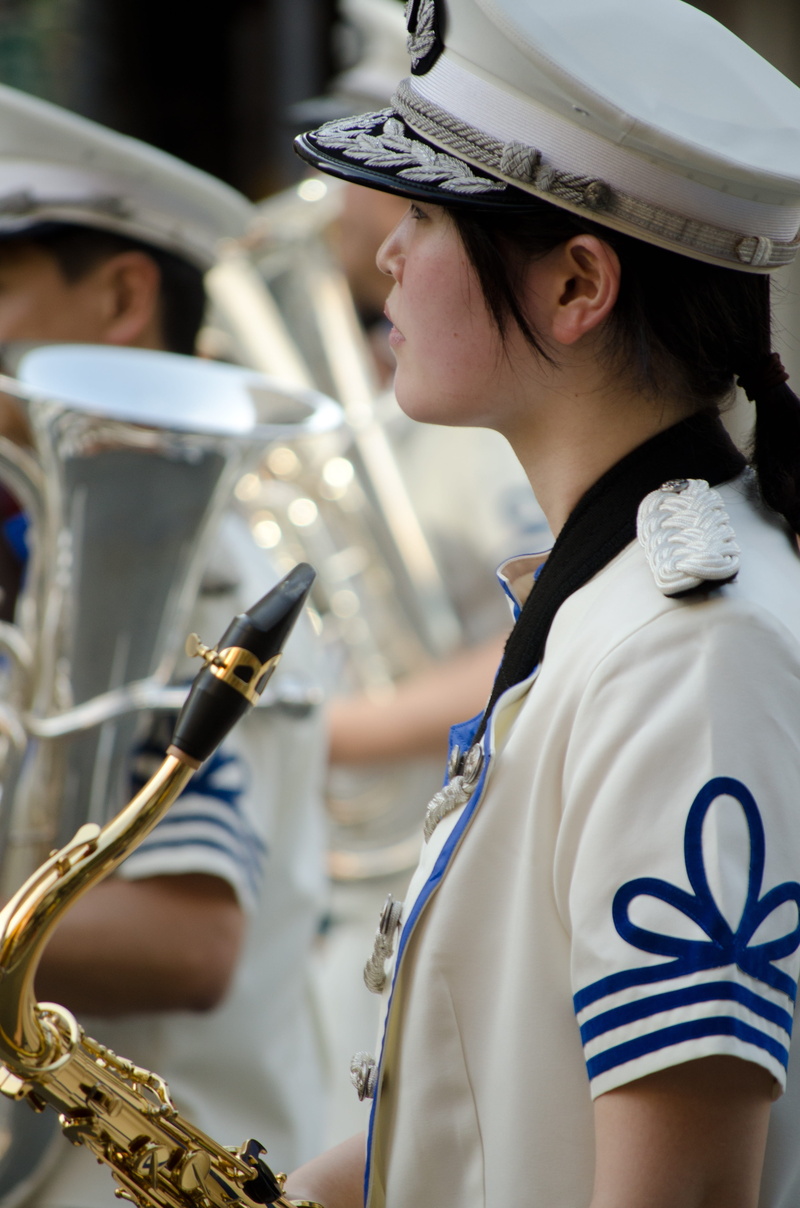 focus on foreground, woman, marching band, headwear, event, kobe, holding, uniform, Band, selective, saxophone, skill, occupation, young adult, portrait