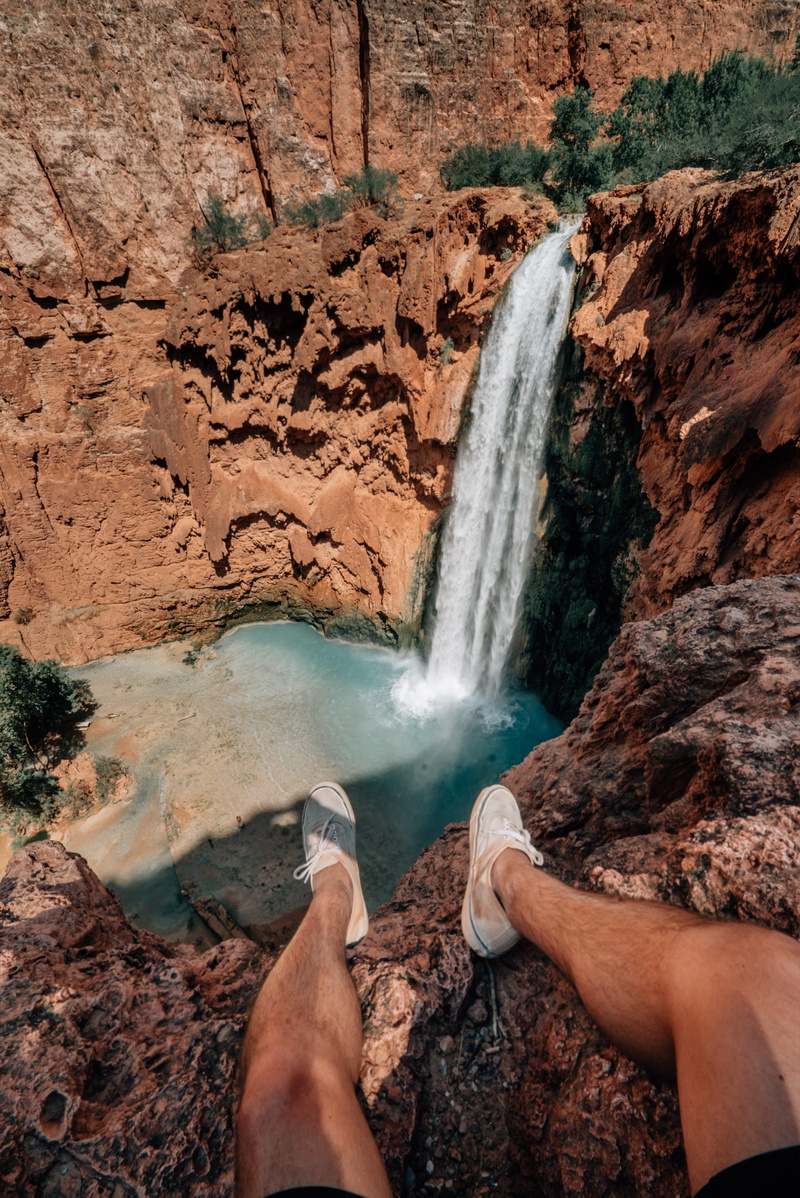 water, solid, arizona waterfall, nature, leg, lake, human body part, havasupai falls waterfall, outdoors, day, sneaker, shoe, 4K, sits, land, orange, beautiful destination