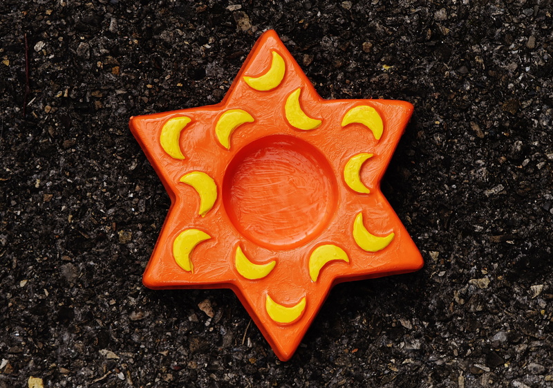 animal, self-made, hand labor, no people, tea light holder, gypsum, red, design, close-up, pattern, moon relief, orange color, shape, 5K, star, craft
