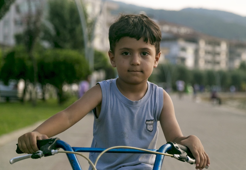 face, portrait, transportation, see, day, bicycle, waist up, red, spider-man, photography, sleep, looking at camera, sad, babies, in tears, waiting, contemplation
