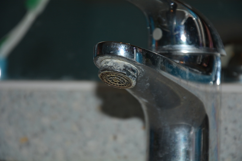 single object, household equipment, softener, close-up, limestone, 5K, outdoors, stainless steel, chrome, metal, reflection, steel, sink, land vehicle