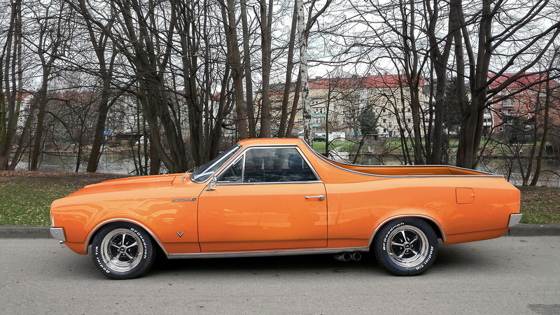 city, mode of transportation, no people, car, automotive, land vehicle, chevrolet, blacktop, woods, motor vehicle, bare tree, style, stationary, retro styled