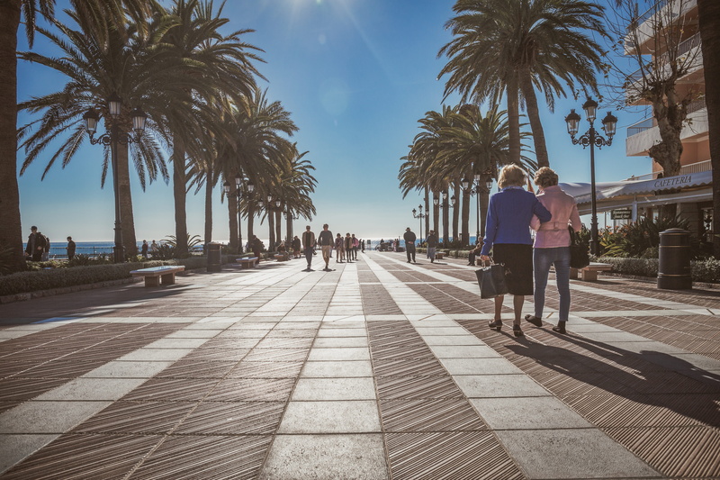 outdoors, group of people, downtown, sunlight, footpath, tropical climate, relaxing, sun, real people, women, nature, walking, urban, noon, pedestrians
