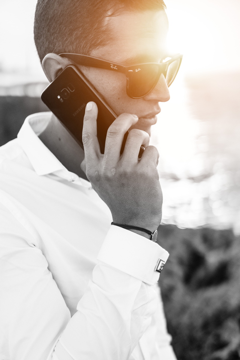morocco, samsung, phone, man, smartphone, real people, gentlemen, sunlight, watch, sun, style, mature men, connection, men, golden hour, rayban, glasses