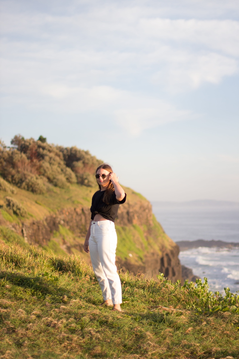 lifestyles, beauty in nature, coastline, rayban, plant, full length, beautiful woman, cliff, casual clothing, leisure activity, sunrise, real people, standing