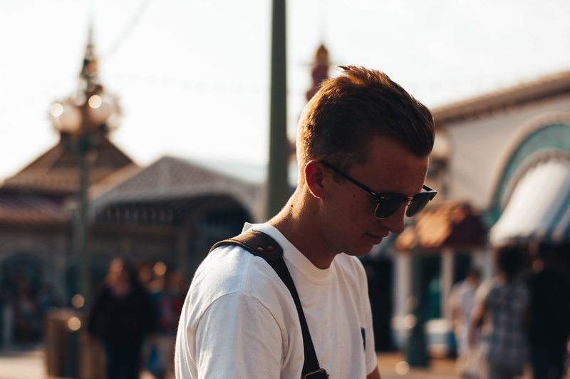 sunglasses, day, outdoors, anaheim, sunlight, lifestyles, profile view, real people, hairstyle, disneyland park, glasses, headshot, young adult, leisure activity