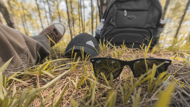one person, lifestyles, grass, leisure activity, cap, walking, unrecognizable person, day, human limb, human leg, trees, cool, nepal, real people, low section