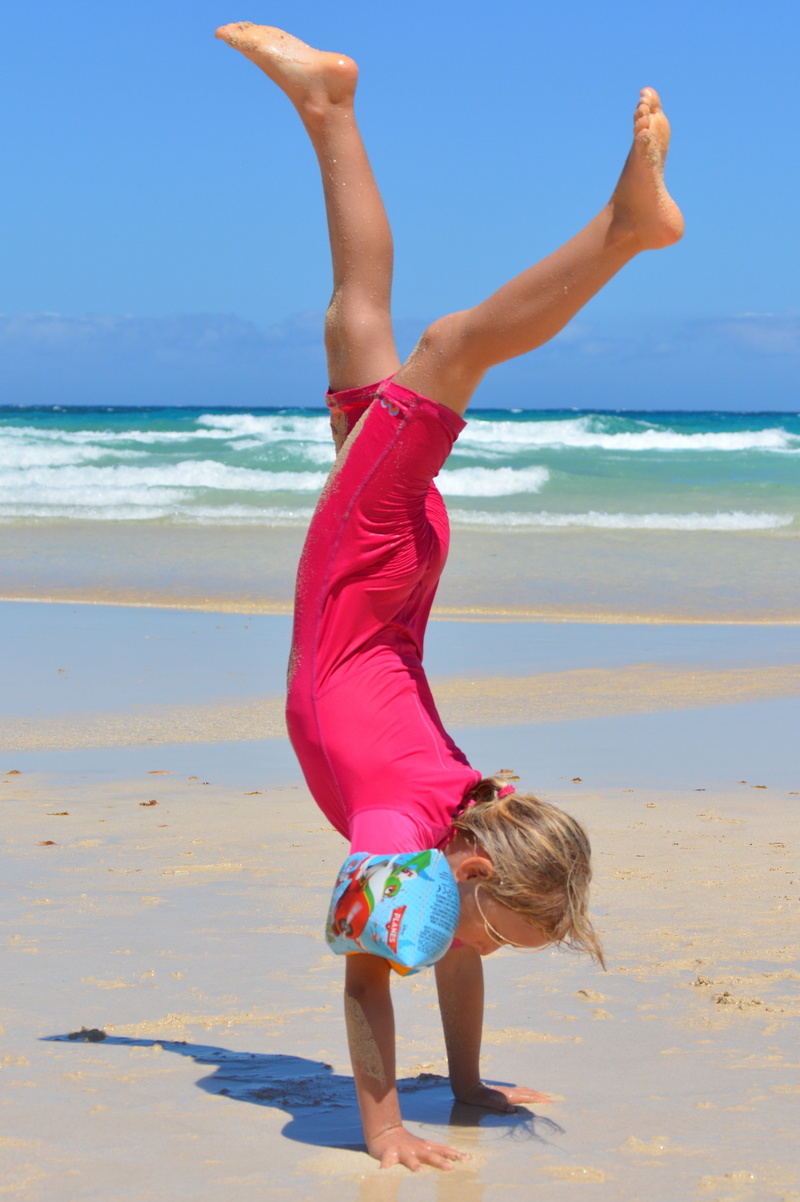 females, people, full length, uv-resistant clothing, real people, women, horizon over water, sport, horizon, summer, outdoors, sky, sand, leisure activity