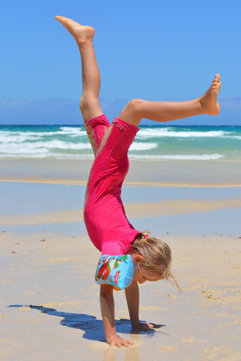 standing, day, 4K, cheerful, joy, water, beach, people, family, uv-resistant clothing, coastline, shore, gymnastics, land, full length, caucasian Ethnicity