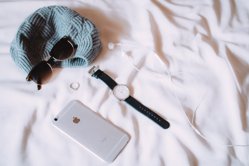 close-up, round, sheet, bed, smartphone, no people, sheets, high angle view, sunglasses, analog, earbuds, strap, table, pen, white color, arts culture and entertainment