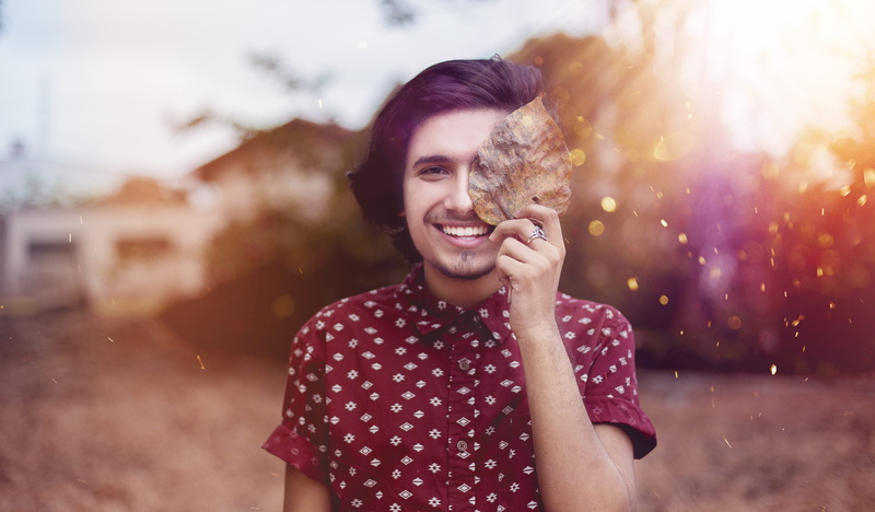 outdoors, fashion, smile, leaf, cheerful, portrait, beautiful people, man, light, cute, young adult, good-looking, architecture, nature, 5K, emotion, waist up
