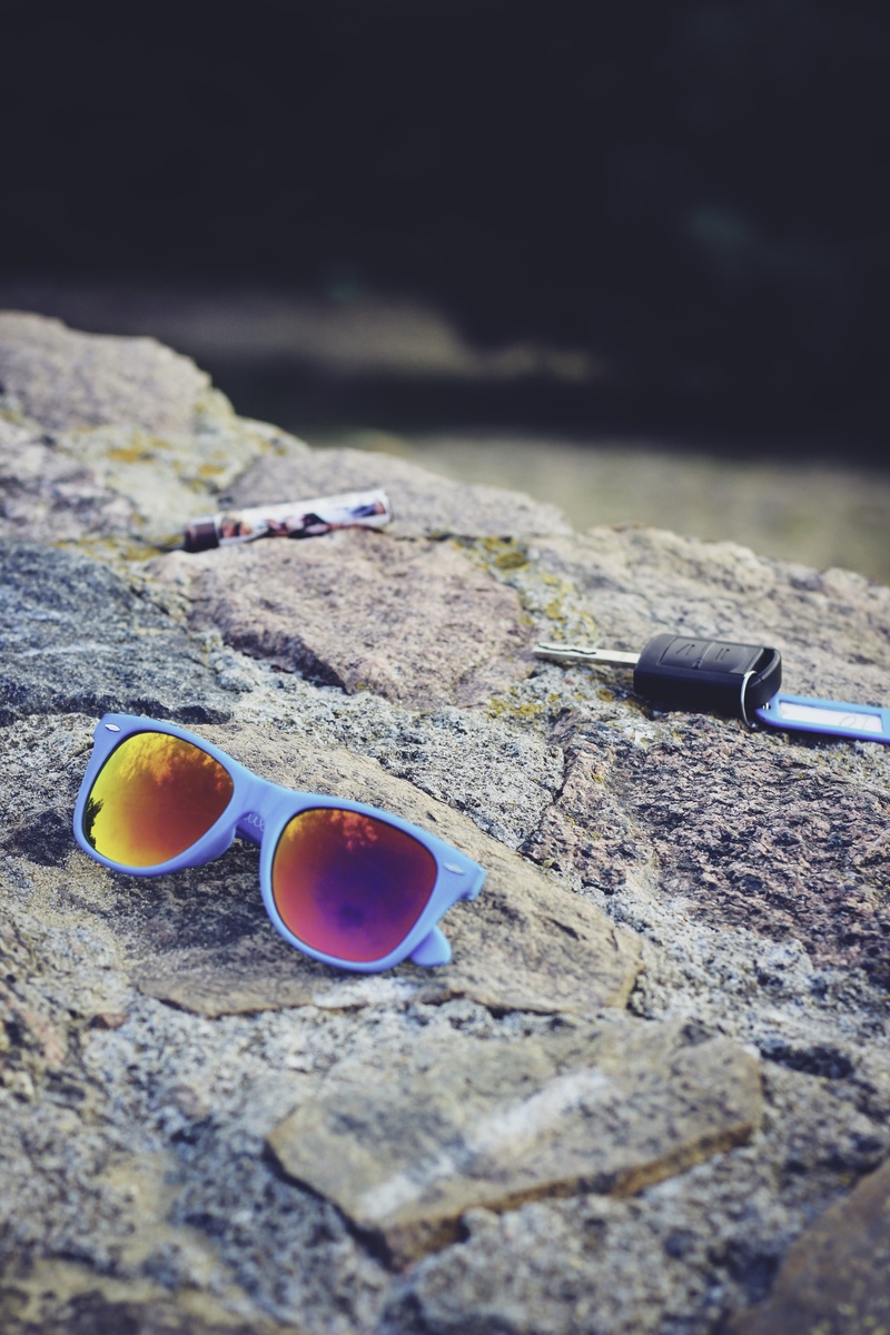 no people, wayfarer, wood - material, 5K, close-up, gray, brush, field, container, land, still life, framed, table, focus on foreground, keys, car, paint