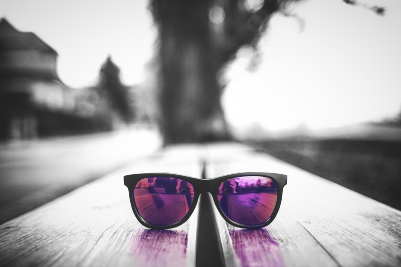 wayfarer, water, sunglasses, day, one person, style, tree, photography, optical, focus on foreground, personal accessory, human body part, reflection, lake