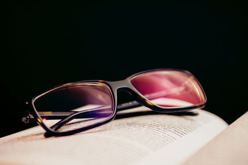 book, page, red, studio shot, black background, day, glasses, sunglasses, black color, nature, personal accessory, close-up, reading, indoors, copy space