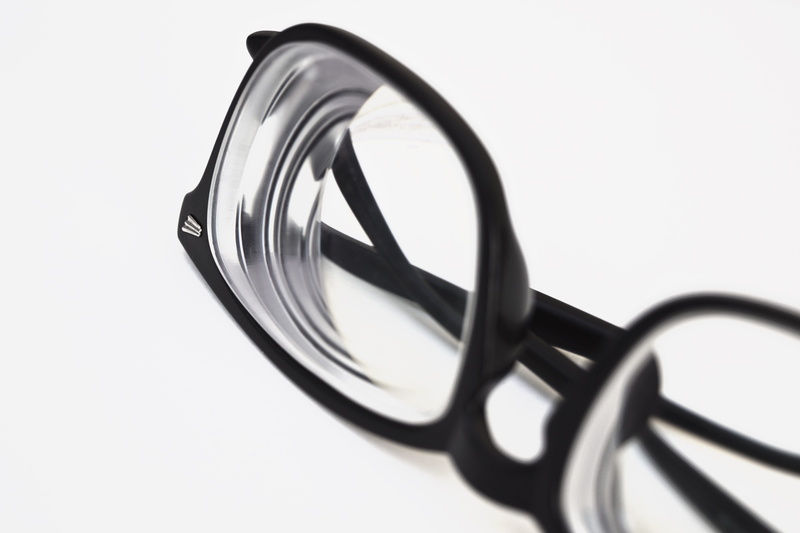 modern, personal accessory, plastic, eyeglasses, indoors, glass - material, shape, close-up, frame, focus on foreground, no people, single object, healthcare