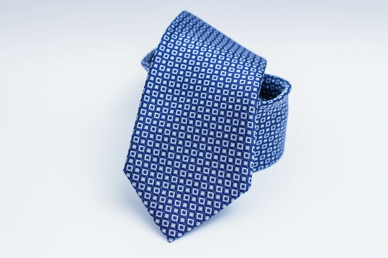 studio shot, indoors, security, necktie, fashion, directly above, creativity, technology, gray, close-up, clothes, protection, simplicity, blue, design