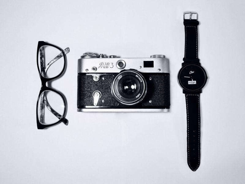 equipment, lens - optical instrument, camera, eyeglasses, analog, nostalgia, land, single object, watch, close-up, antique, number, indoors, technology