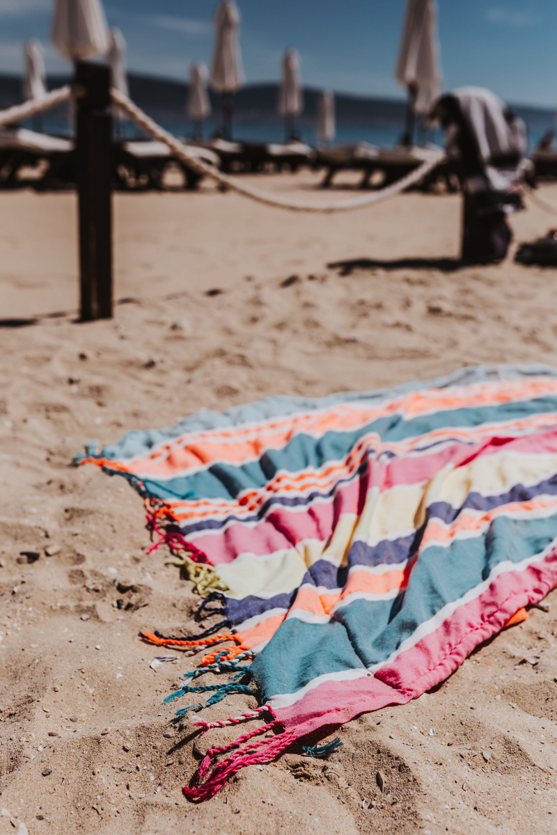 vacations, sunlight, Colorful, incidental people, pattern, selective focus, beach towel, towel, travel, tranquility, land, focus on foreground, fun, relaxation