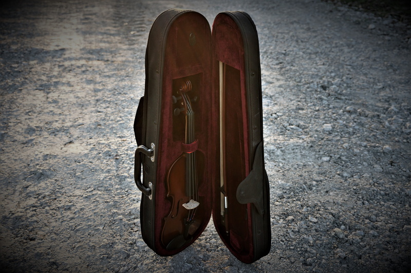 street, music, classical, melody, sunlight, city, single object, orchestra, day, musical, shoe, violinist, 5K, absence, flooring, musician, outdoors, still life