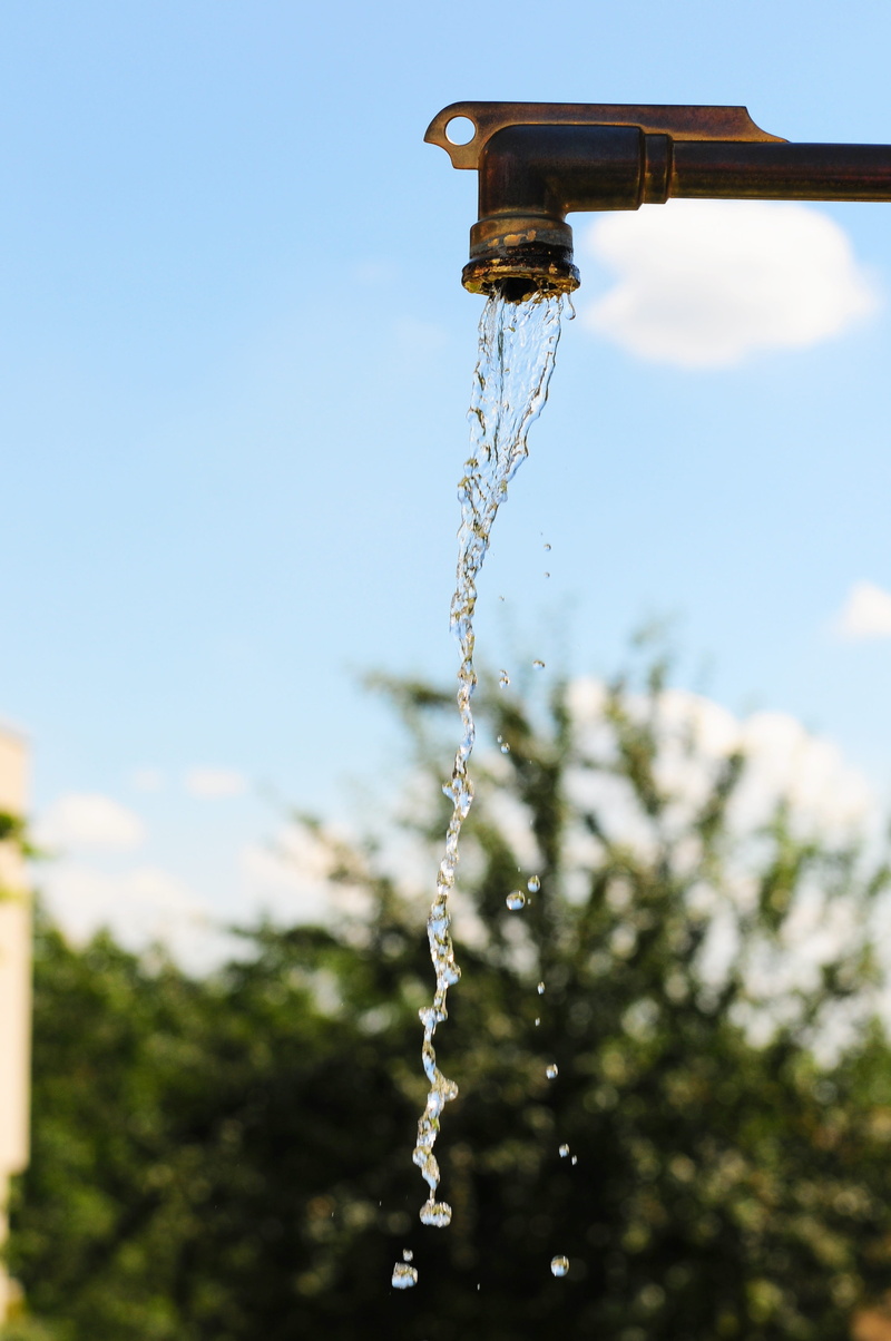 day, focus on foreground, water, source, nature, nostalgia, gold, clouds, close-up, fountain, sun, drop of water, water source, no people, flowing water