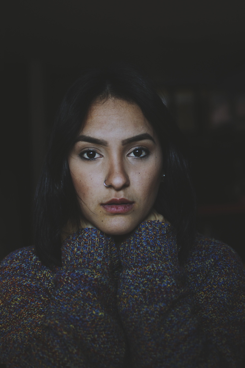 sweater, photo, #colombia, real people, lifestyles, front view, women, s, looking at camera, serious, adult, contemplation, warm clothing, close-up, human face