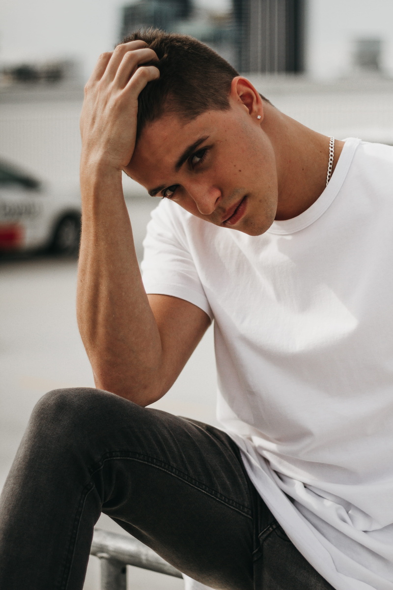 car, love, sitting, model, cars, young adult, 5K, adult, gold coast, mall, contemplation, male, casual clothing, carpark, day, lifestyles, indoors, grey