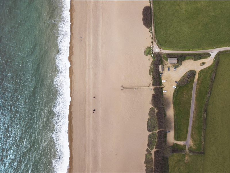 aquatic sport, tree, outdoors, built structure, plant, carpark, united kingdom, bike, aerial, aerial view, scenery, beach, sea, sand, photography, seashore