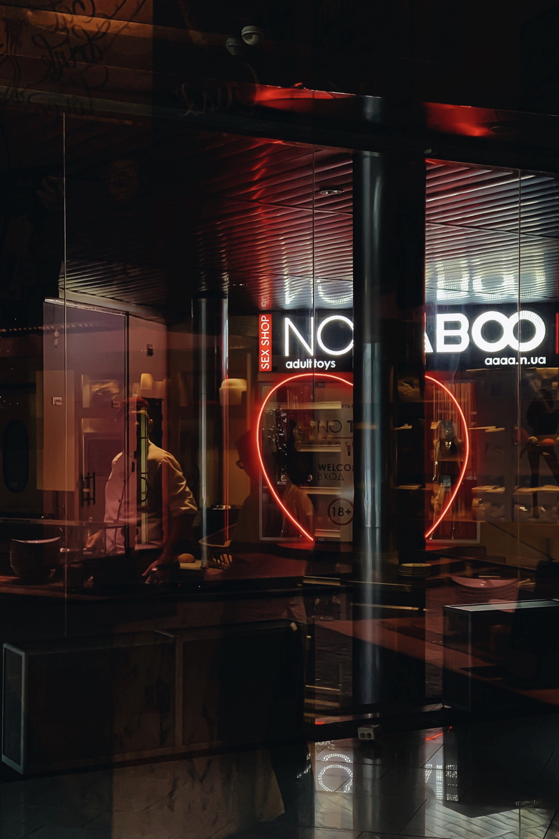 restaurant, banister, night, lighting equipment, human, indoors, communication, light - natural phenomenon, light, alcohol, train, pub, illuminated, meal