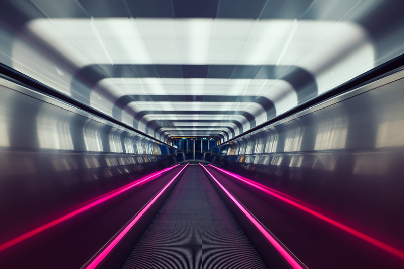moving walkway, architecture, illuminated, absence, tunnel, vanishing point, red, indoors, oslo, motion, fluorescent light, metal, no people, diminishing perspective