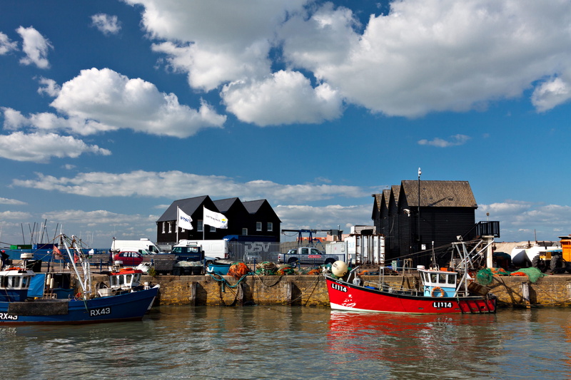 building exterior, clouds, boat, Classic, passenger craft, coast, captured, fishing boat, building, built structure, harbor, sky, harbour, various, transportation