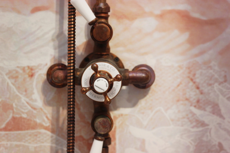 brick, ornate, architecture, pattern, shower, antique, copper, shower faucet, fixture, day, no people, screen, valve, wall - building feature, design, bath