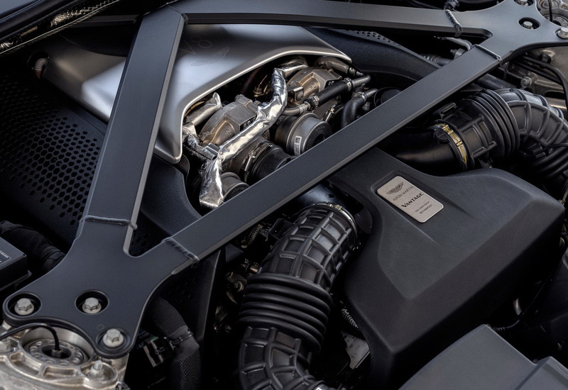 vantage, dashboard, motor vehicle, indoors, luxury, car interior, metal, technology, black color, gearshift, mode of transportation, steering wheel, transportation