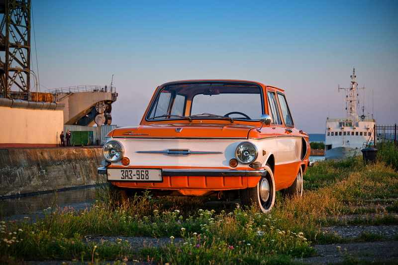 rusty, motor vehicle, sunlight, machine, machinery, transportation, land Vehicle, red, plant, vintage Car, travel, classic, building exterior, architecture